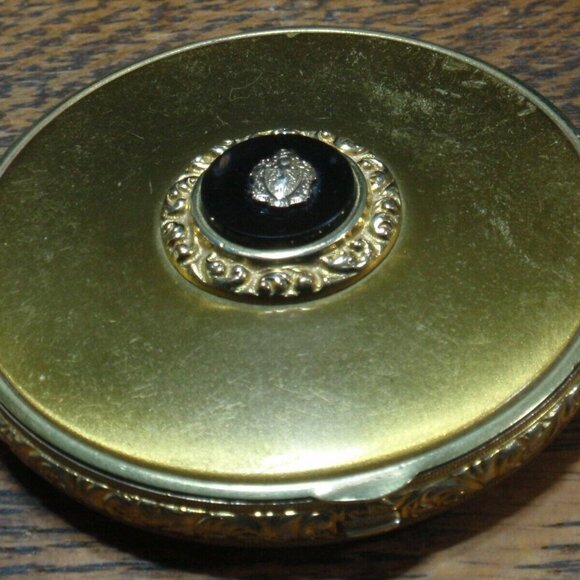 Gold Guild Compact with Sterling and Onyx Emblem.